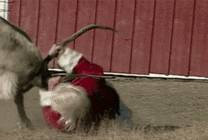 圣诞老人抱着梅花鹿摔跤GIF图片