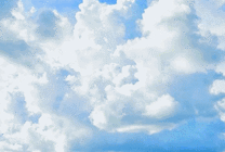 蓝色天空下快速漂移的白云GIF图片