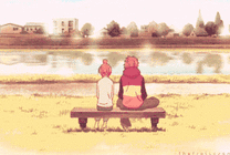 情侣一起坐在湖边的长凳上看风景gif图片