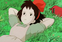 可爱的卡通女孩躺在草地上任风不停的吹gif图片