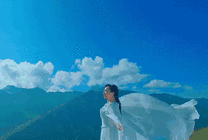 站在高山上看蓝天白云神清气爽gif图片