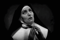 修女诚心的向恶魔祈祷gif图片