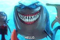 卡通大鲨鱼张着嘴露出一排整齐的牙齿GIF图片